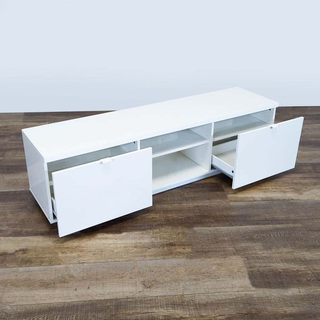 2. White Reperch entertainment center with both side doors open, showing inner storage compartments and shelves.