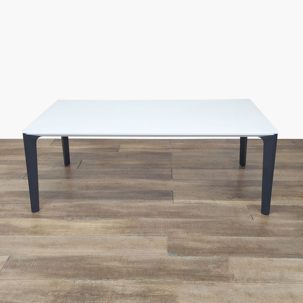 1. Modern Bontempi dining table with white matte glass top, sturdy metal frame, and solid wood lacquered legs.  