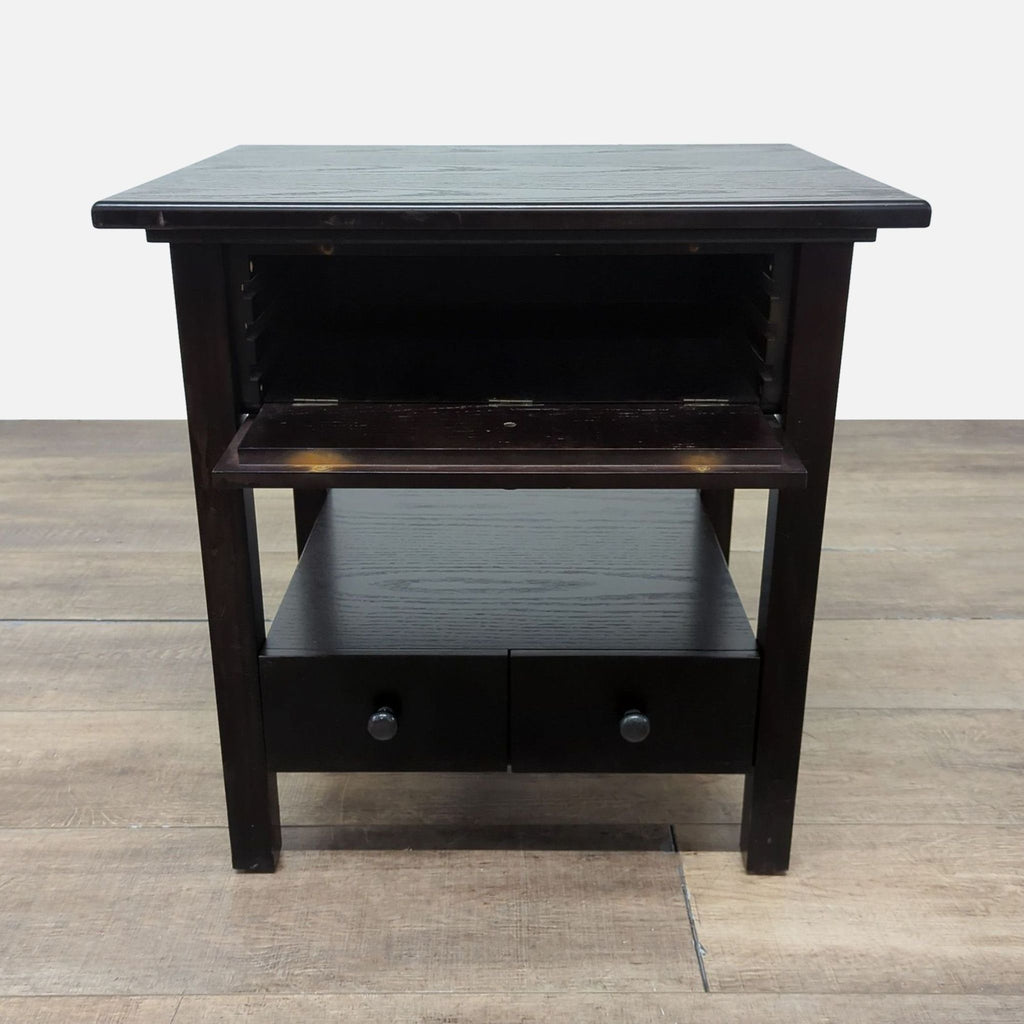 3. Crate & Barrel dark wood end table front view, open tray and drawers, with a center shelf underneath.