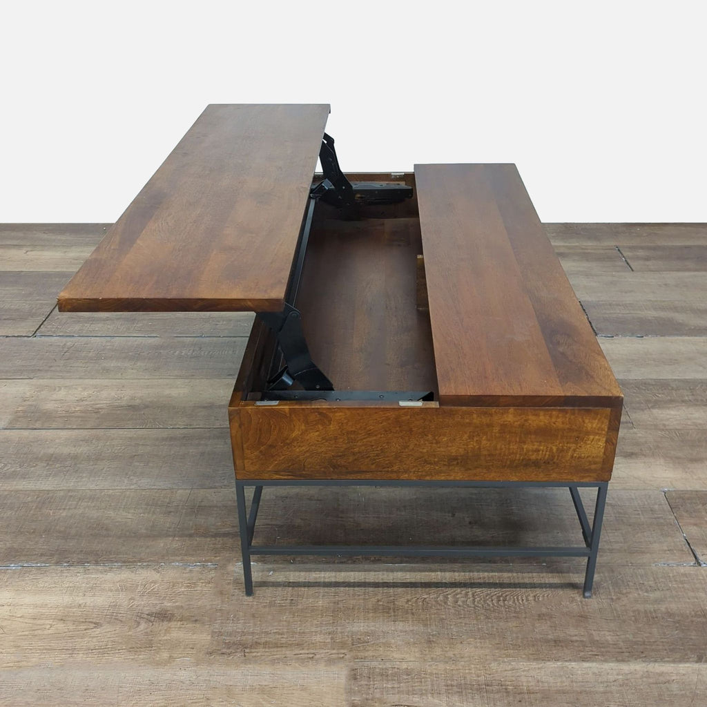 3. Rectangular mango wood and steel coffee table with a malfunctioning lift-top, categorized as West Elm furniture.