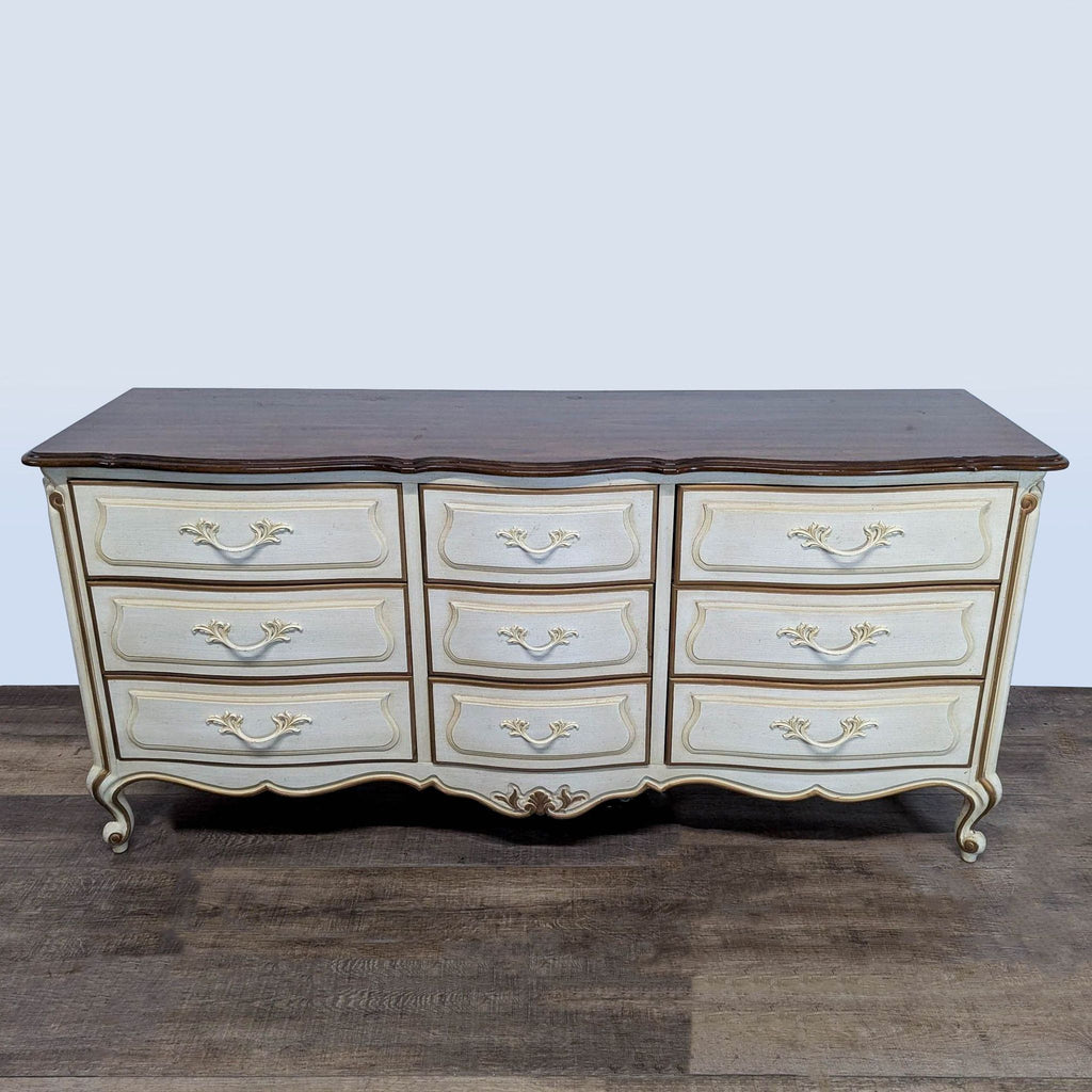 Drexel Heritage Furniture dresser featuring intricate trim, soft curves, and original handles, photographed head-on.  