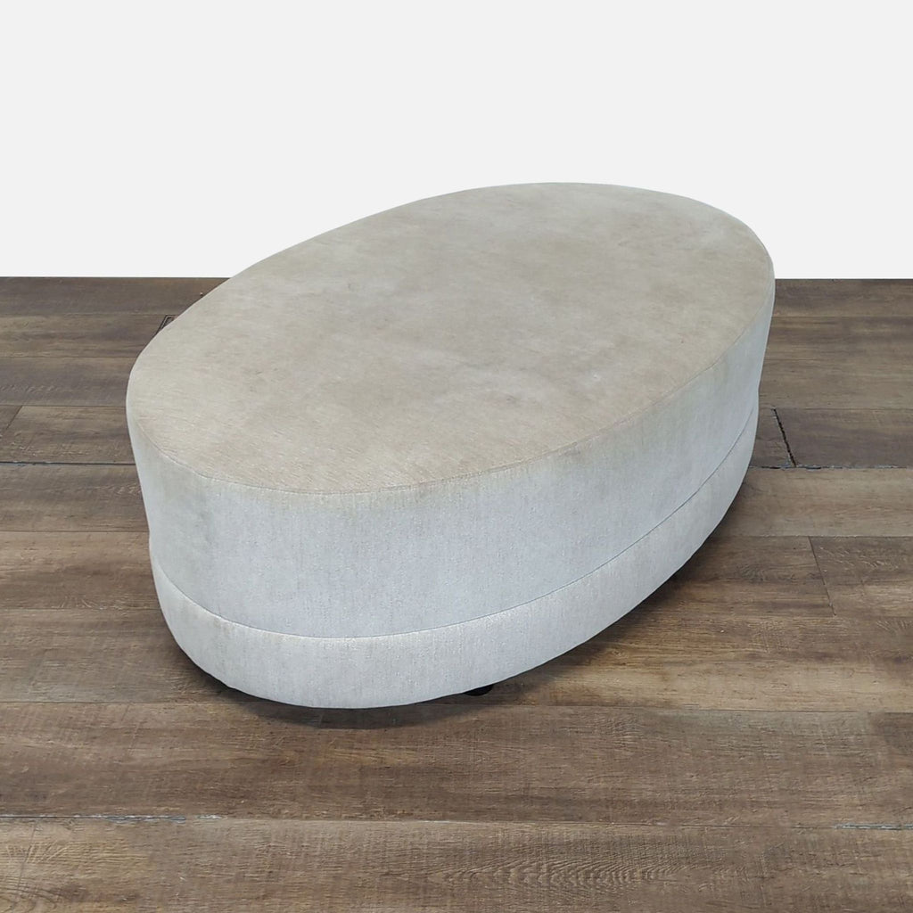 Oval Fabric Covered Ottoman