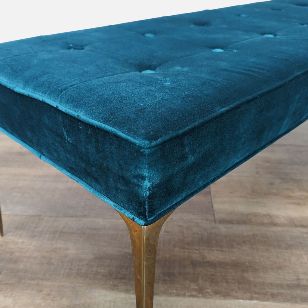 Close-up of the teal velvet Custom Signature Stiletto bench corner with a polished brass leg.