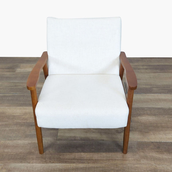 1. Front view of a Home Artisan mid-century lounge chair with white upholstery and a low-profile wooden frame.