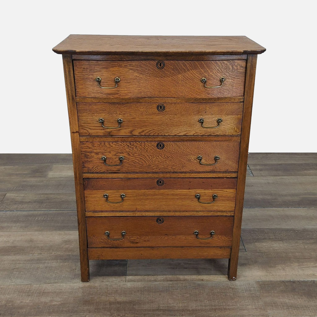 1. Front view of Reperch oak dresser with five drawers, brass bail pulls, and dovetail joinery.  