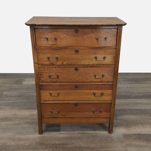 1. Front view of Reperch oak dresser with five drawers, brass bail pulls, and dovetail joinery.  