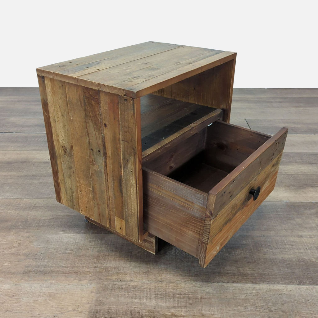 2. Angled view of West Elm rustic wood nightstand with open drawer and visible interior space.