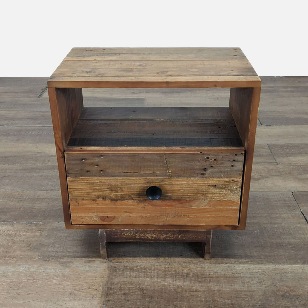 1. Rustic West Elm wood end table with drawer and open shelf, shown on wooden flooring.