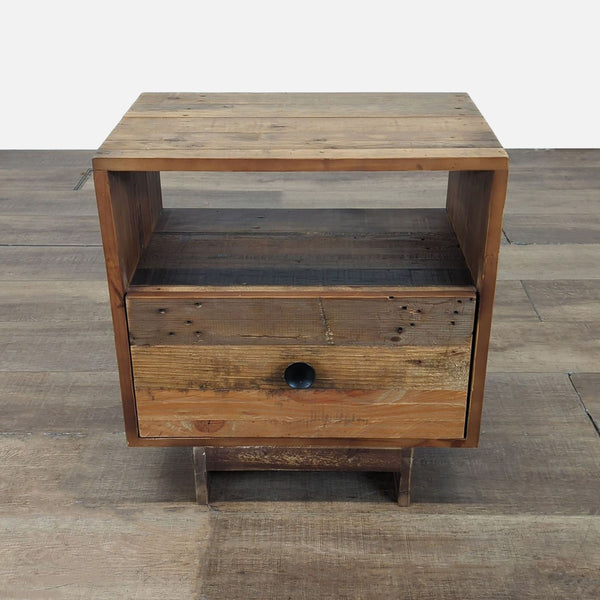 1. Rustic West Elm wood end table with drawer and open shelf, shown on wooden flooring.