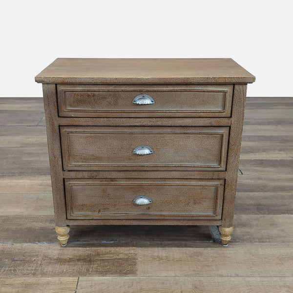 1. Pottery Barn dresser with lathe turned legs, molded trim, and three spacious drawers for storage, closed view.