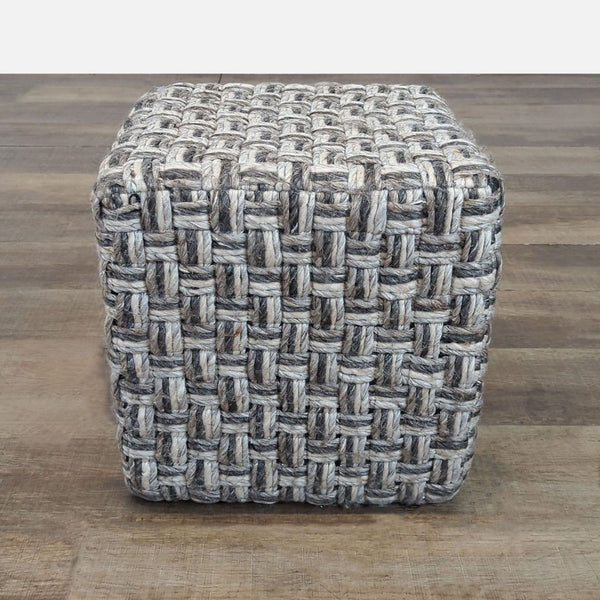 1. Square hassock ottoman with chunky hand-woven basket weave in charcoal, camel, gray, and cream tones by Surya.  
