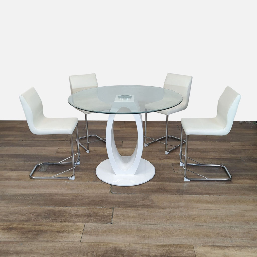 Modern dining set by Furniture Of America with round glass-top table, white base, and four white leatherette chairs.