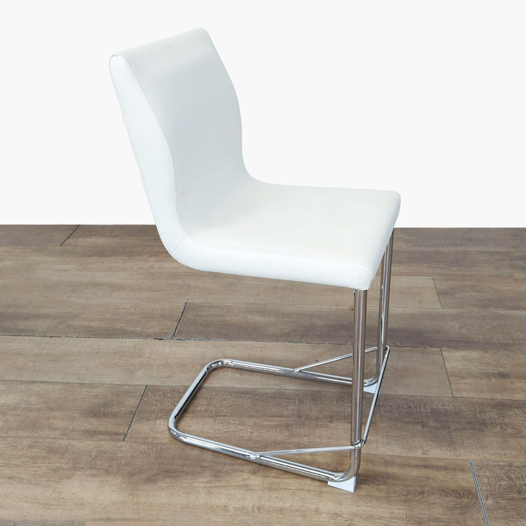 Single white leatherette dining chair with chrome legs, part of Furniture Of America’s modern dining set collection.