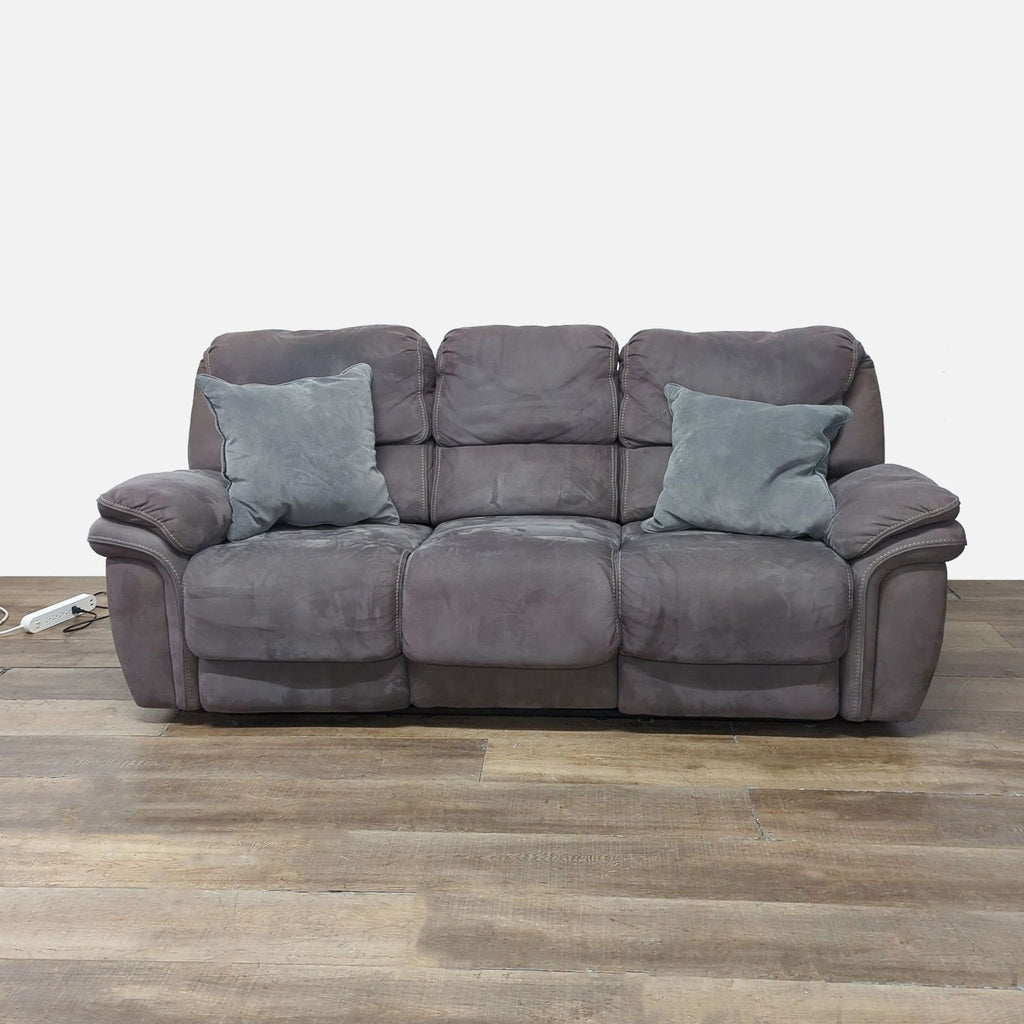 1. Reperch 3-seat sofa with plush cushions and two power reclining seats in grey, shown with accent pillows.