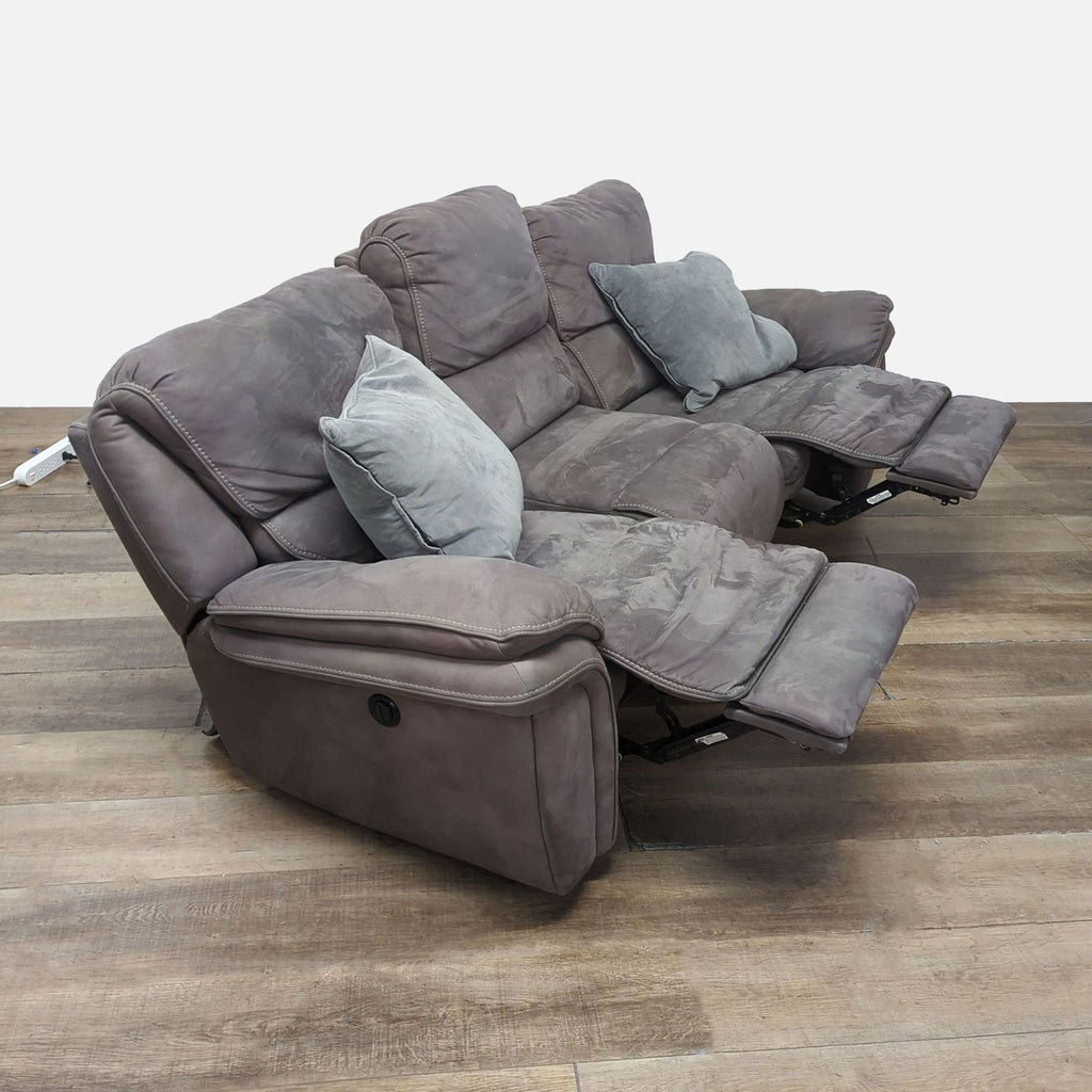 2. Side view of Reperch 3-seat sofa displaying extended power recliners and plush cushioning, includes accent pillows.