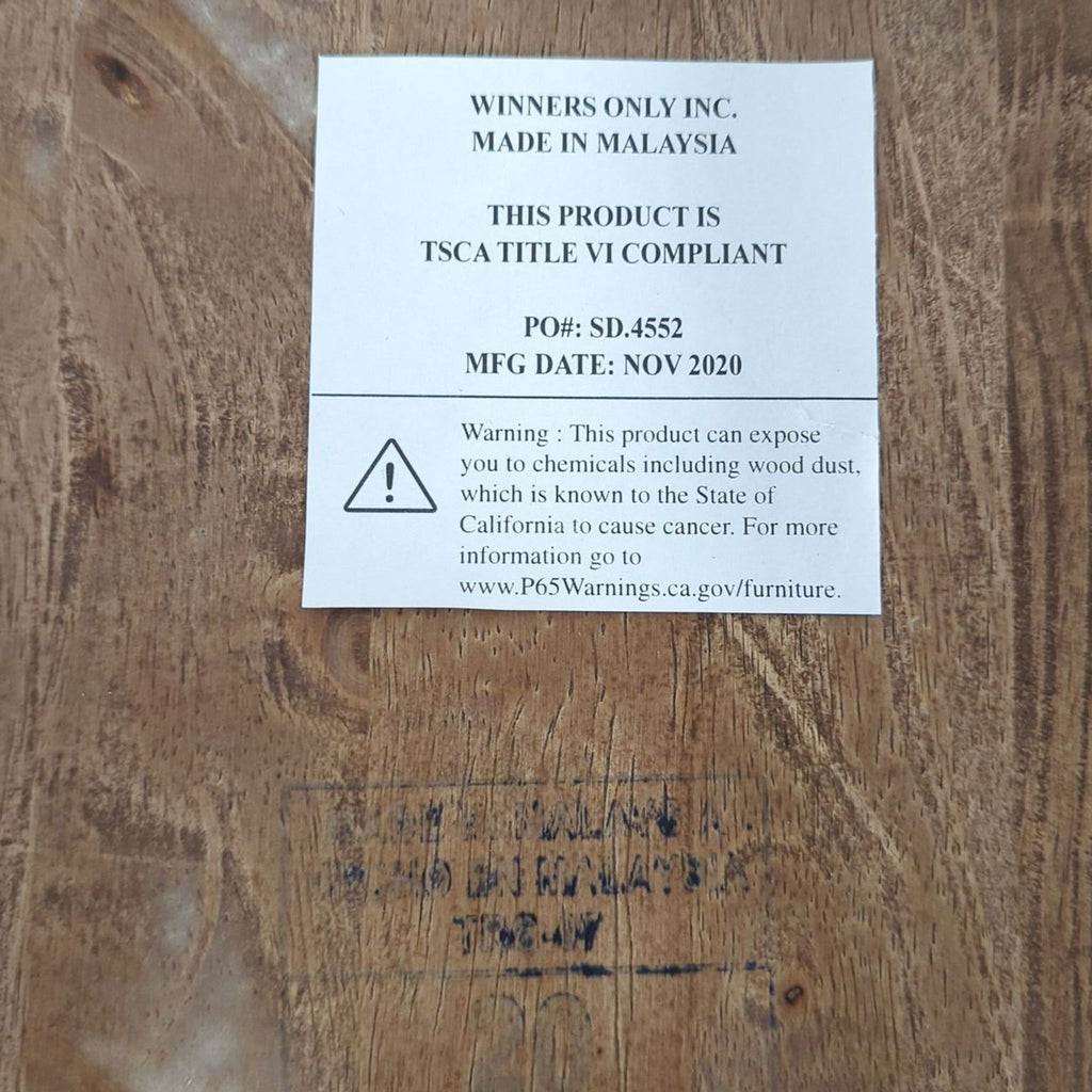 2. Close-up of product label for a Winners Only, Inc. stool, detailing compliance and safety warning.