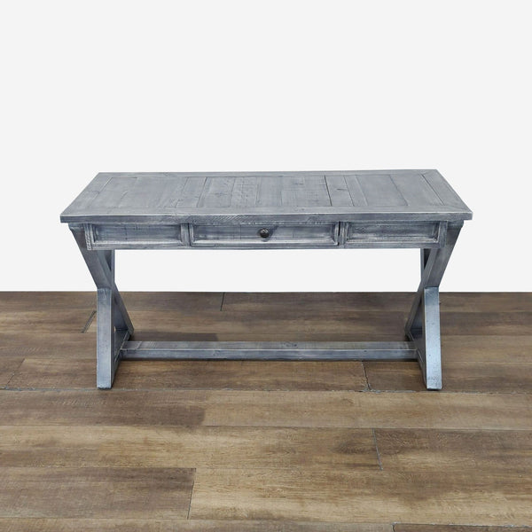 1. Grey Reperch side and console table with single center drawer and cross-leg design, on wood floor.