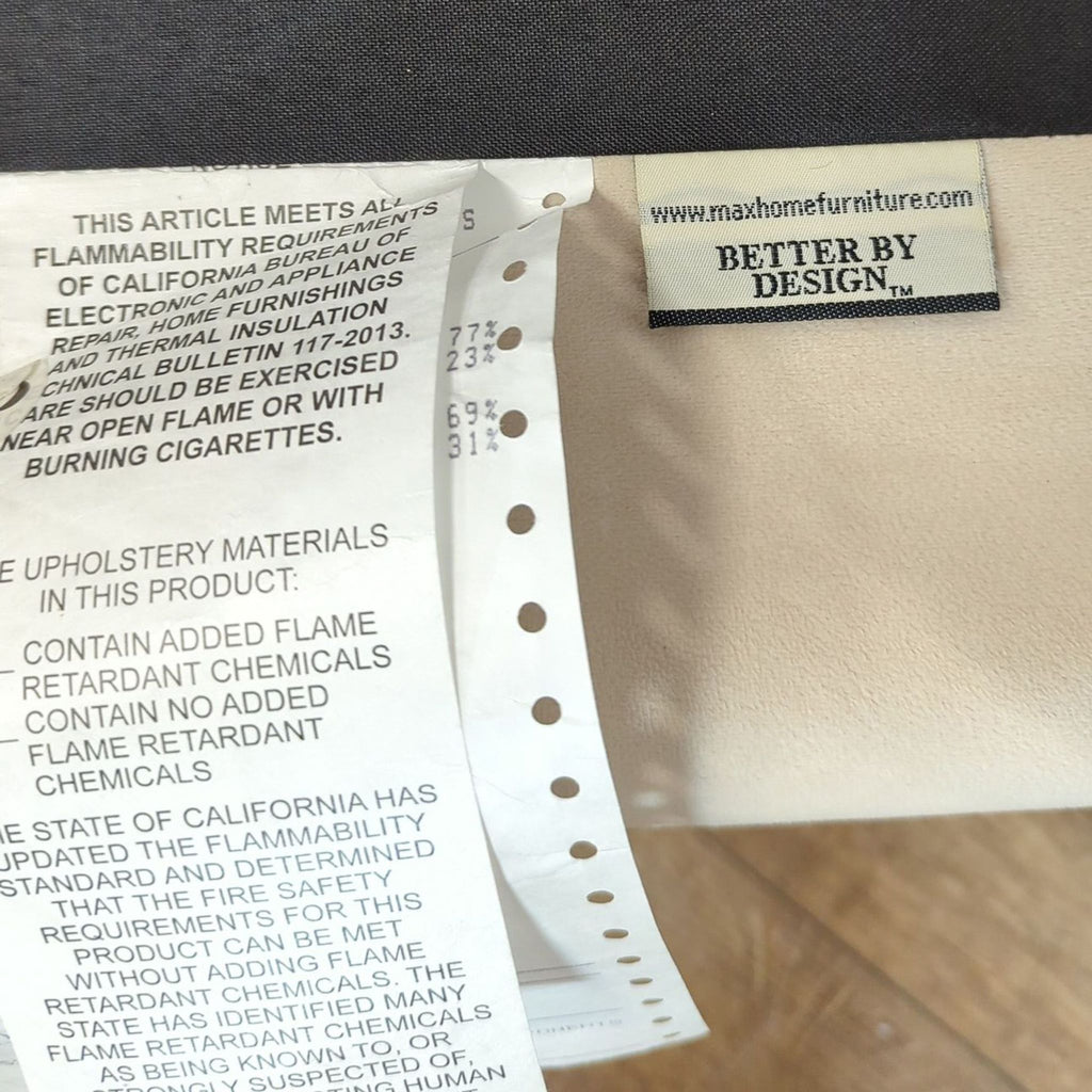 3. Product tag and care label for upholstery, including flammability information, attached to furniture.