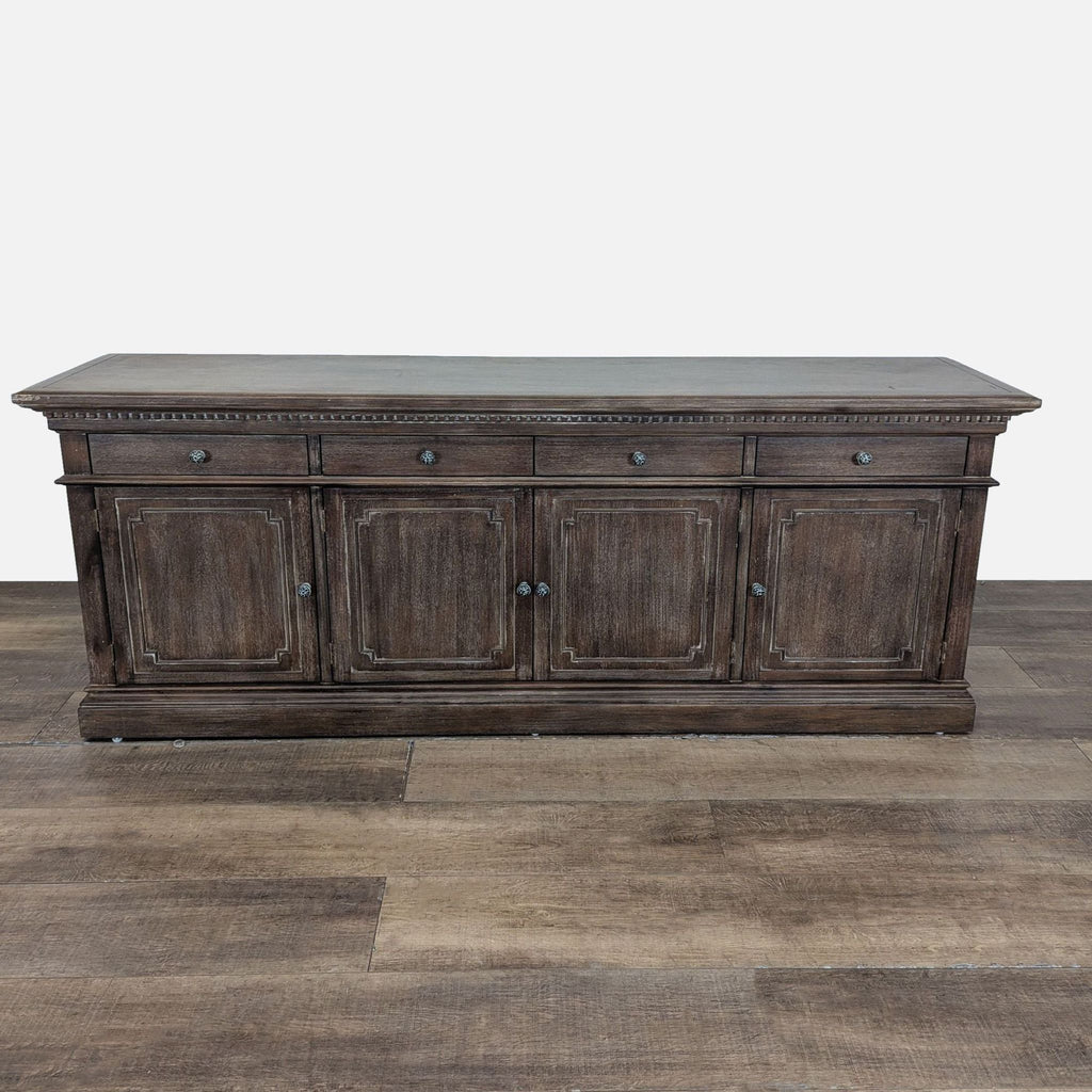 1. Classic-style dark wood sideboard with four drawers and hand-carved details by Restoration Hardware.
