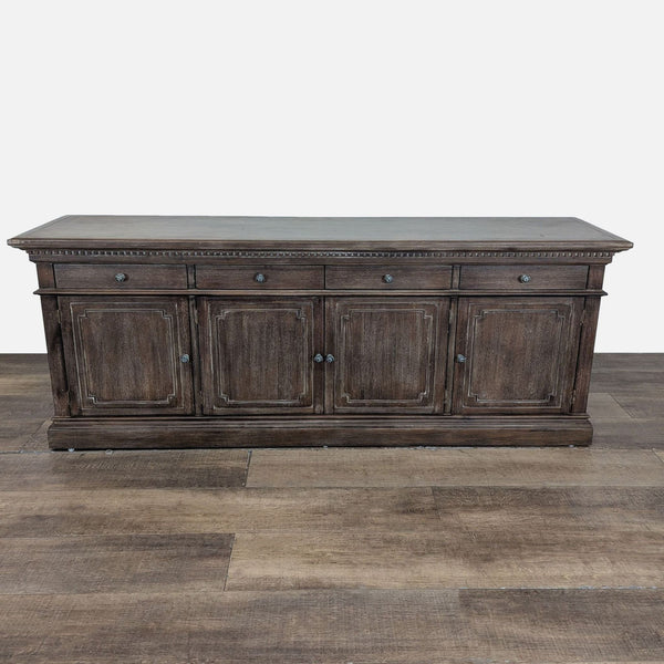 1. Classic-style dark wood sideboard with four drawers and hand-carved details by Restoration Hardware.