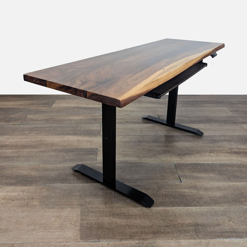 3. Angled perspective of Reperch desk showing wood top, programmable height controls, and keyboard drawer.