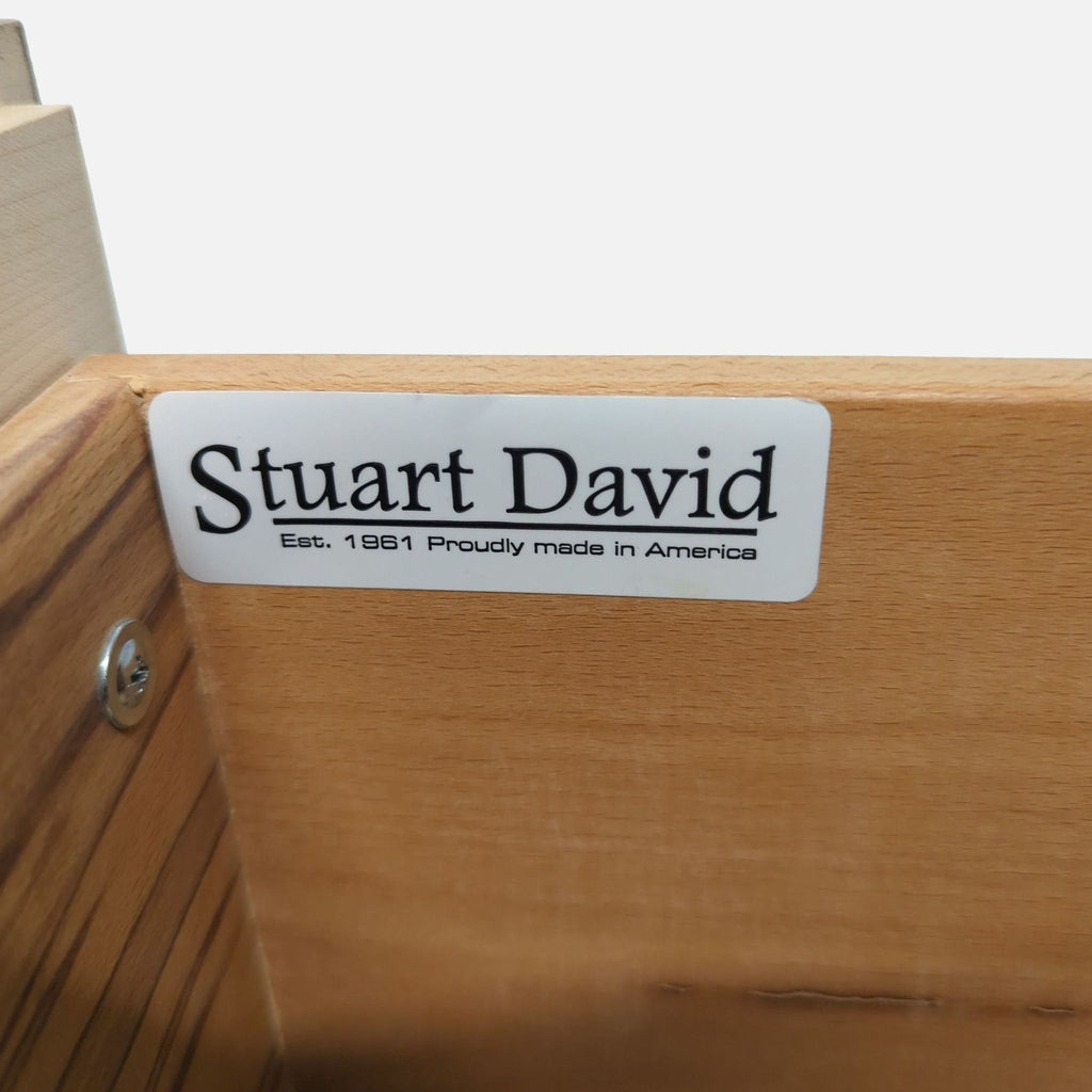 2. Close-up of Stuart David brand label inside the solid wood dresser drawer, stating made in America.