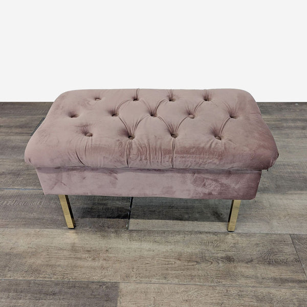 1. Velvet tufted pink ottoman bench by Reperch with gold legs, placed on a wooden floor.