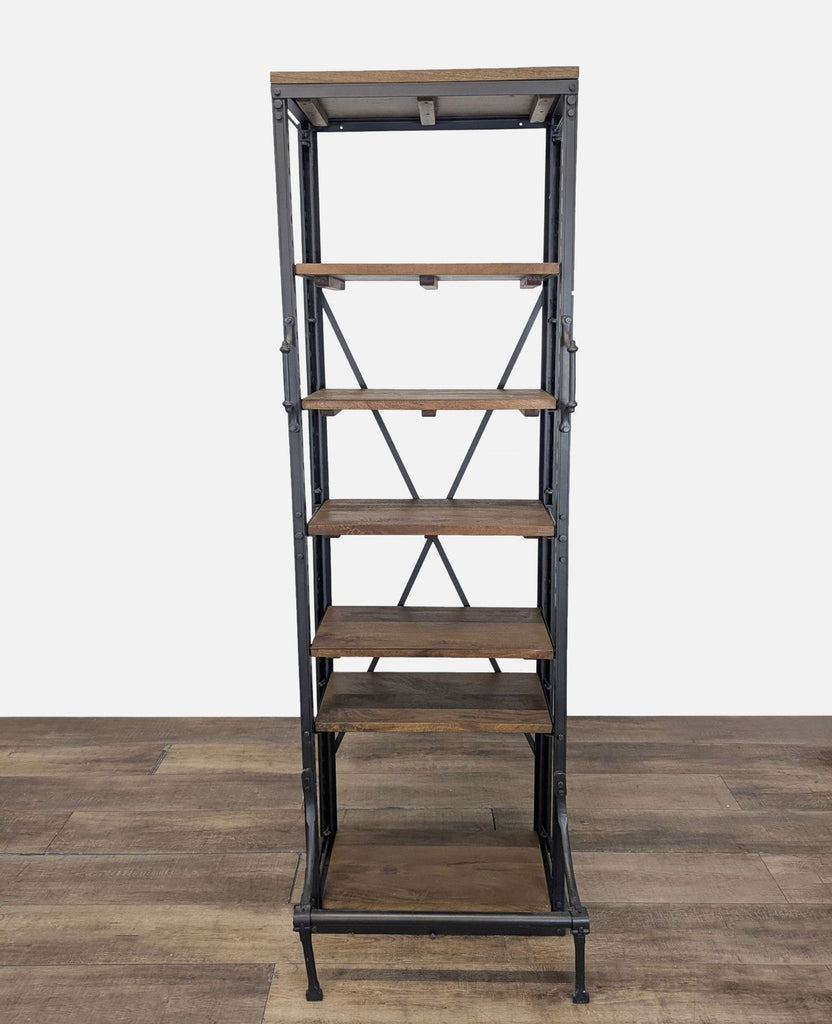1. Restoration Hardware bookshelf with a dark metal frame, five wood shelves, and foot railing, shown from the front.  