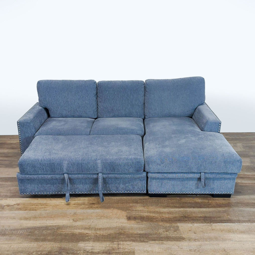 2. Reperch sectional sleeper sofa extended with pull-out trundle bed, durable blue chenille upholstery, front view.