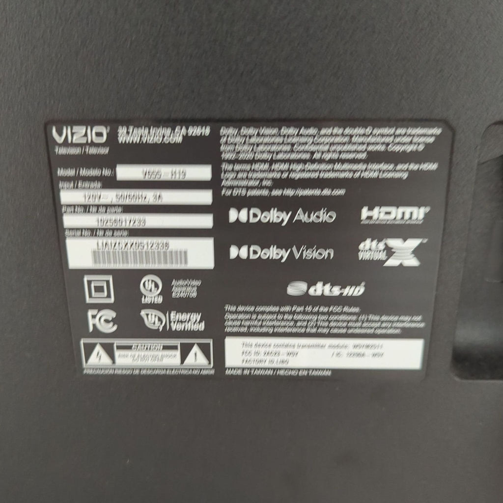 3. Close-up of back label on Vizio V655-H19 TV, showing model number and supported features like Dolby Vision.