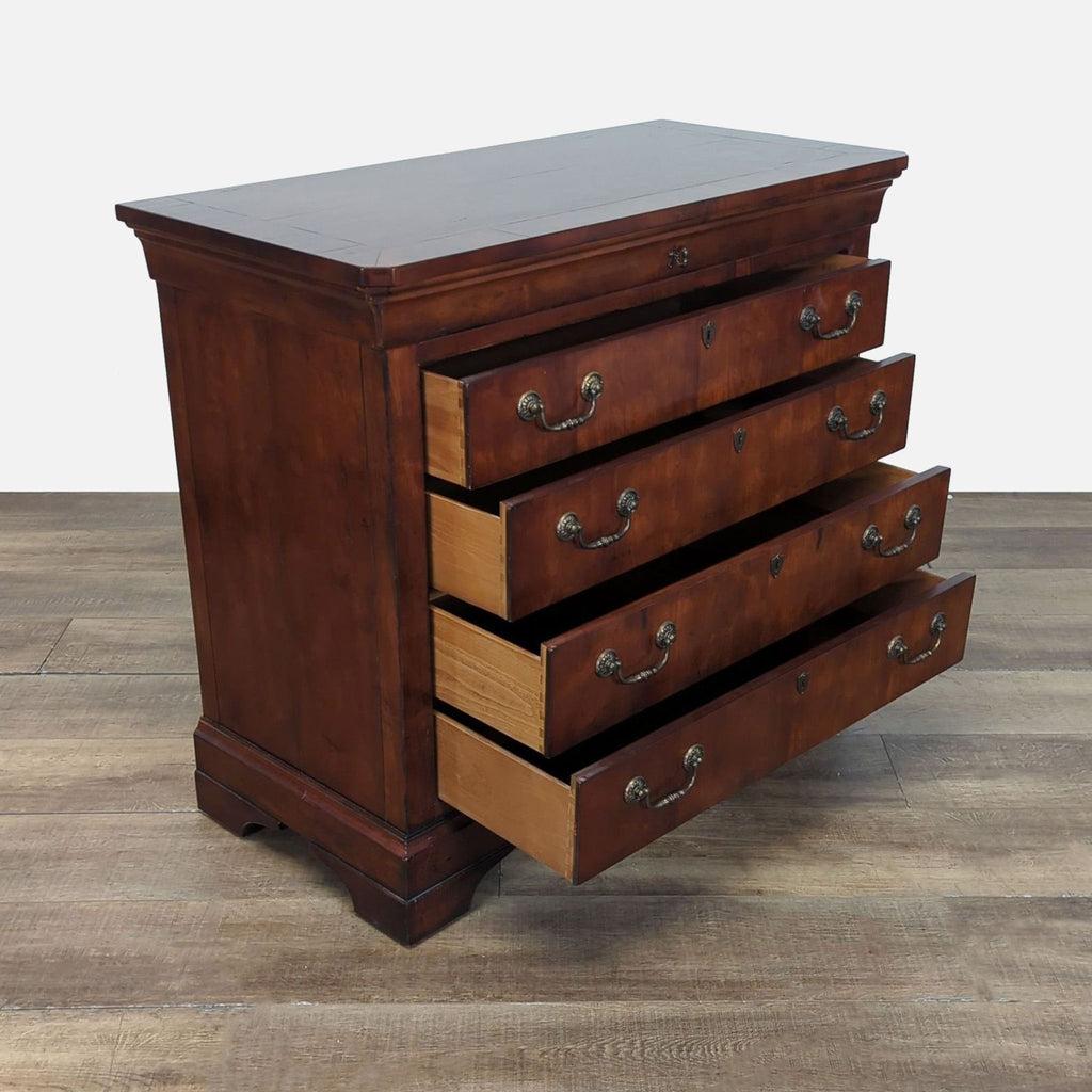 Henredon mahogany dresser with three open drawers, featuring brass drop handles and keyholes.  