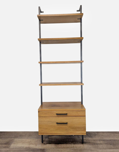 1. Wall-mounted CB2 bookshelf with walnut veneer shelves and two drawers on a black steel frame, shown front view.