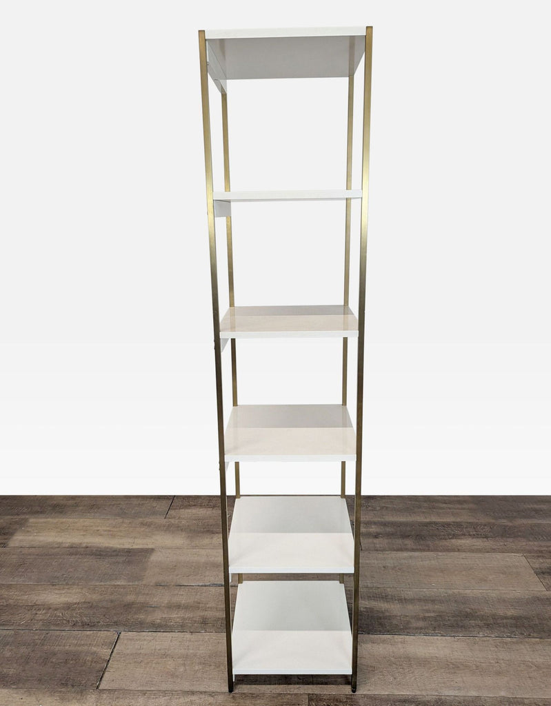 1. Tall white and gold bookcase with five shelves, modern lines, semi-matte finish, and adjustable levelers.  