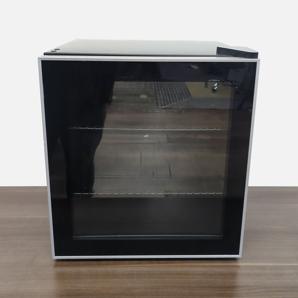 1. Antarctic Star compact refrigerator with glass door and two shelves, ideal for home or office use.  