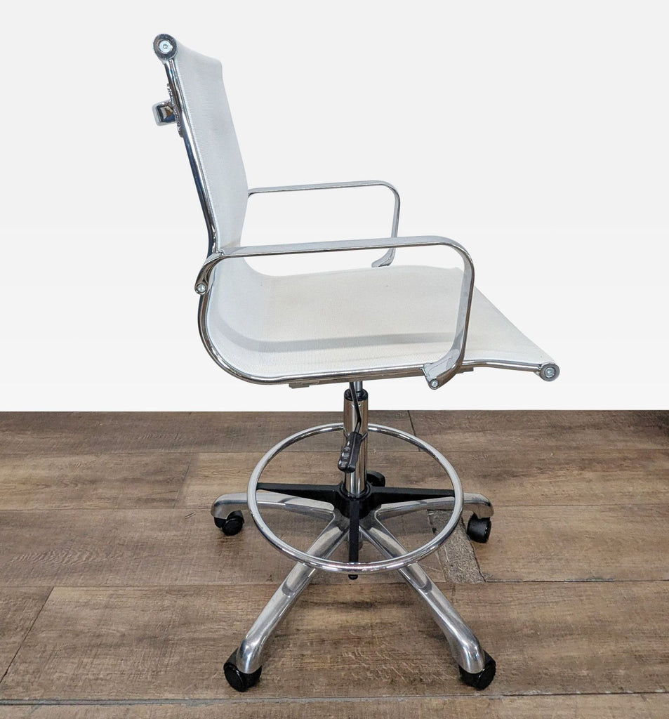 2. Modern white swivel rolling chair featuring chrome arms, foot ring, and five caster wheels.