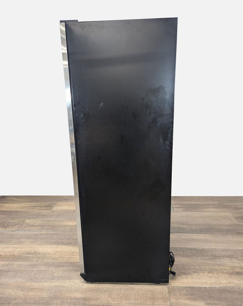 3. Side view of the Reperch Vinopro BU-490D-X wine fridge, showing its black exterior and modern profile.