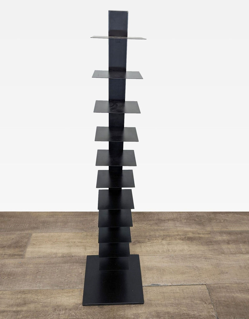 3. Reperch vertical bookshelf featuring lift-up shelves for customizable height, designed for a sleek, floating look.