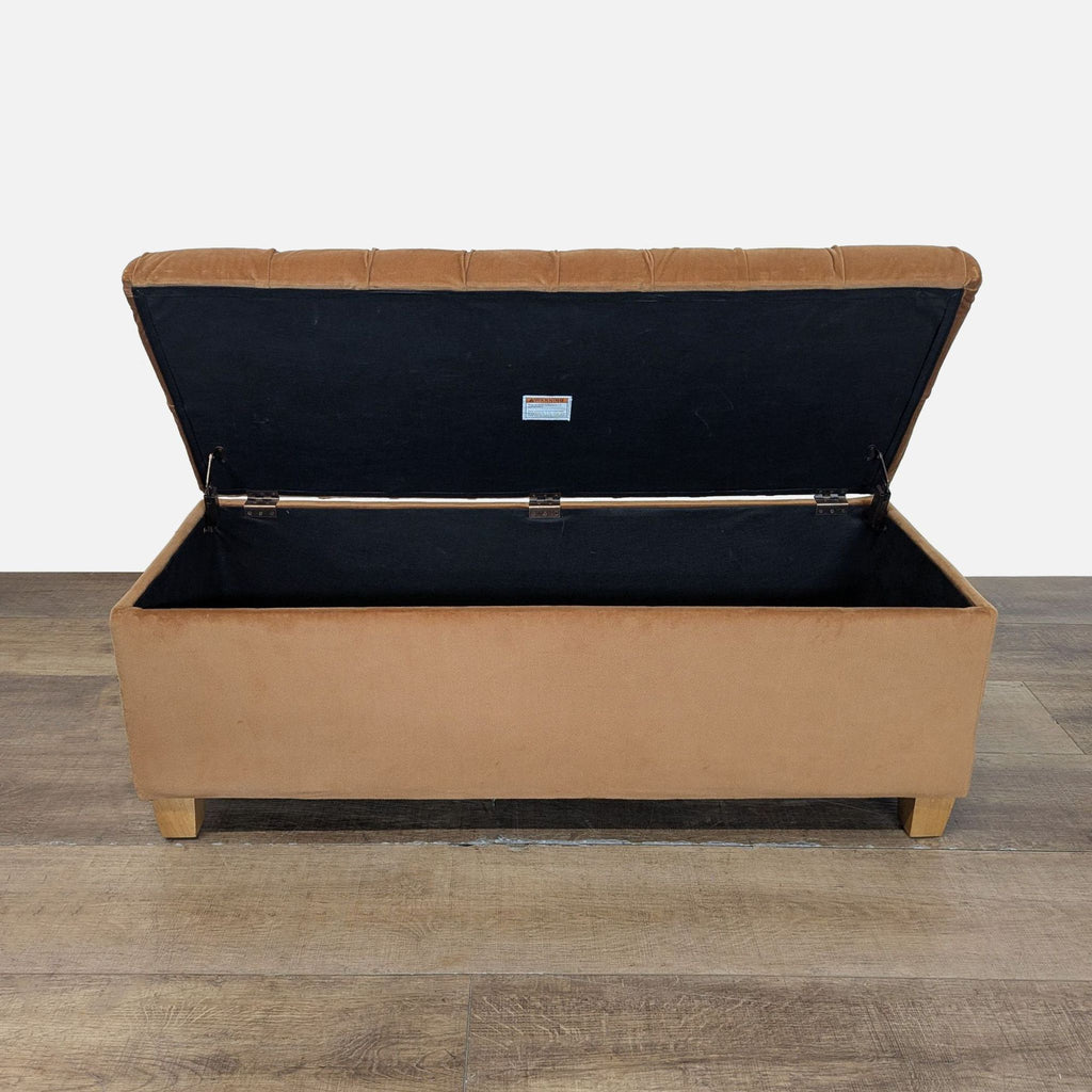 2. Reperch ottoman bench in brown, displaying open storage compartment and black interior lining.
