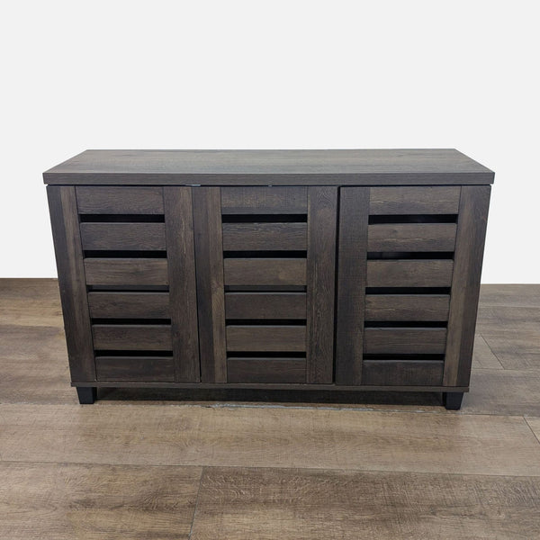1. Dark brown Synergy House storage cabinet with closed slatted doors, placed on a wooden floor.