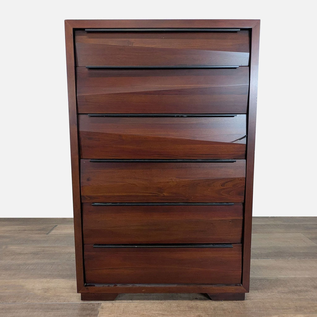 1. Front view of a Reperch dresser with a dark finish and minimalist black bar handles.