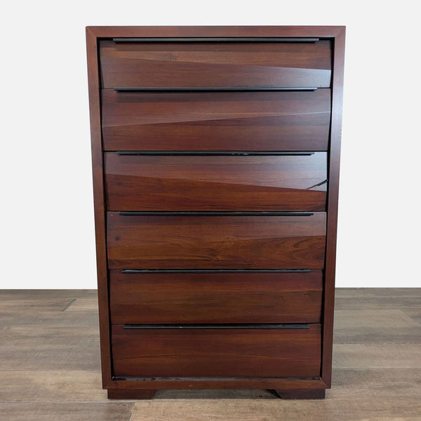 1. Front view of a Reperch dresser with a dark finish and minimalist black bar handles.