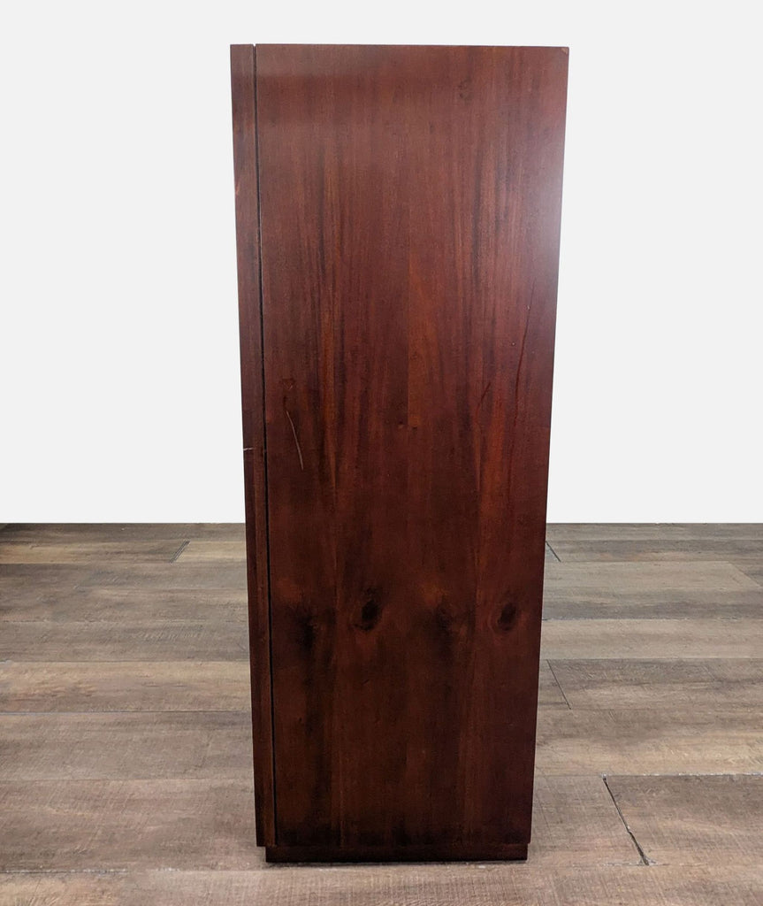 3. Side profile of a Reperch dark-finished dresser from the Dressers category, minimalist design visible.