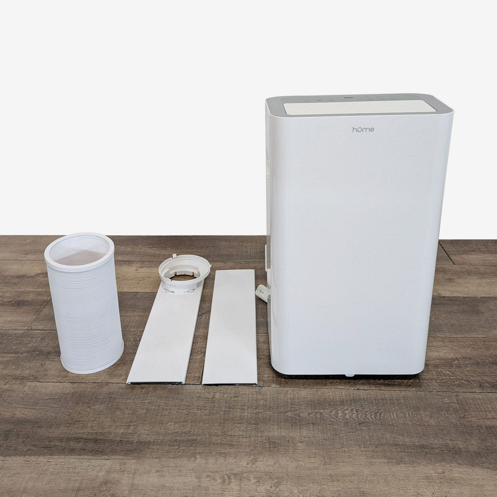 2. Home portable air conditioner shown with included hose, window kit, and accessories for easy setup and cooling.