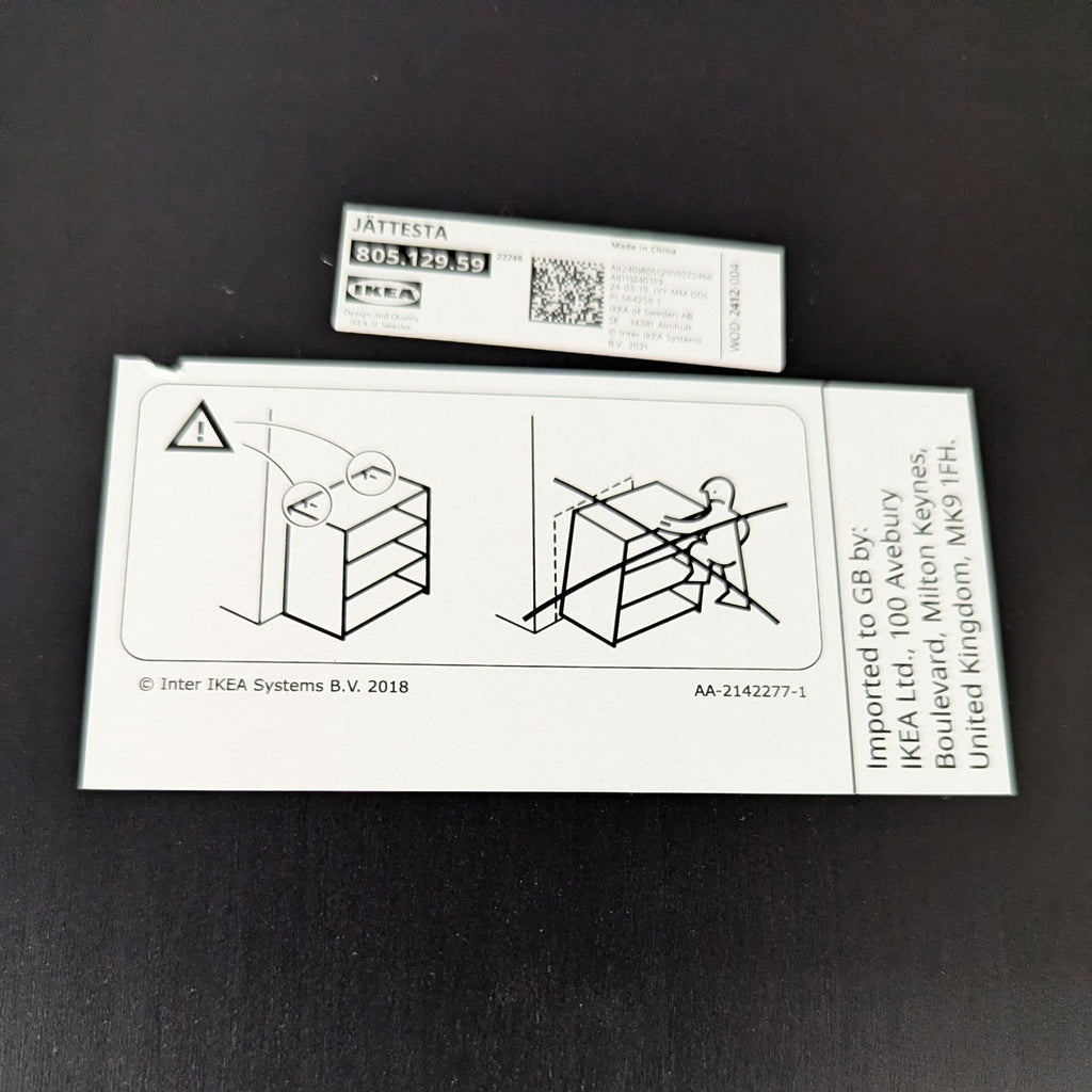 3. Ikea bookshelf label and safety instructions, showing product name and anti-tip warnings.