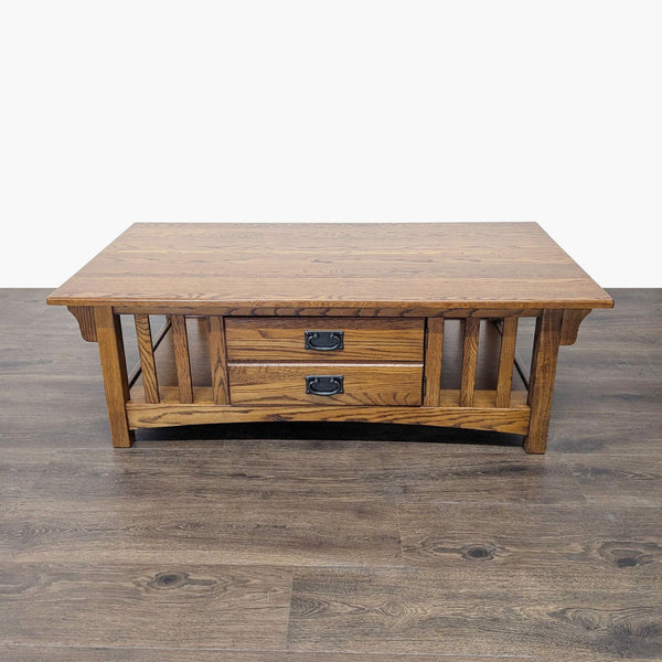 1. Reperch wooden coffee table with two front drawers and slatted sides, shown on a wood floor.