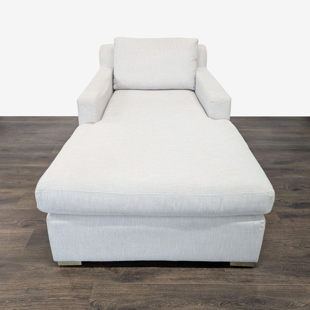 2. Front view of a modern, light gray Restoration Hardware lounge chaise with arms and back cushion.