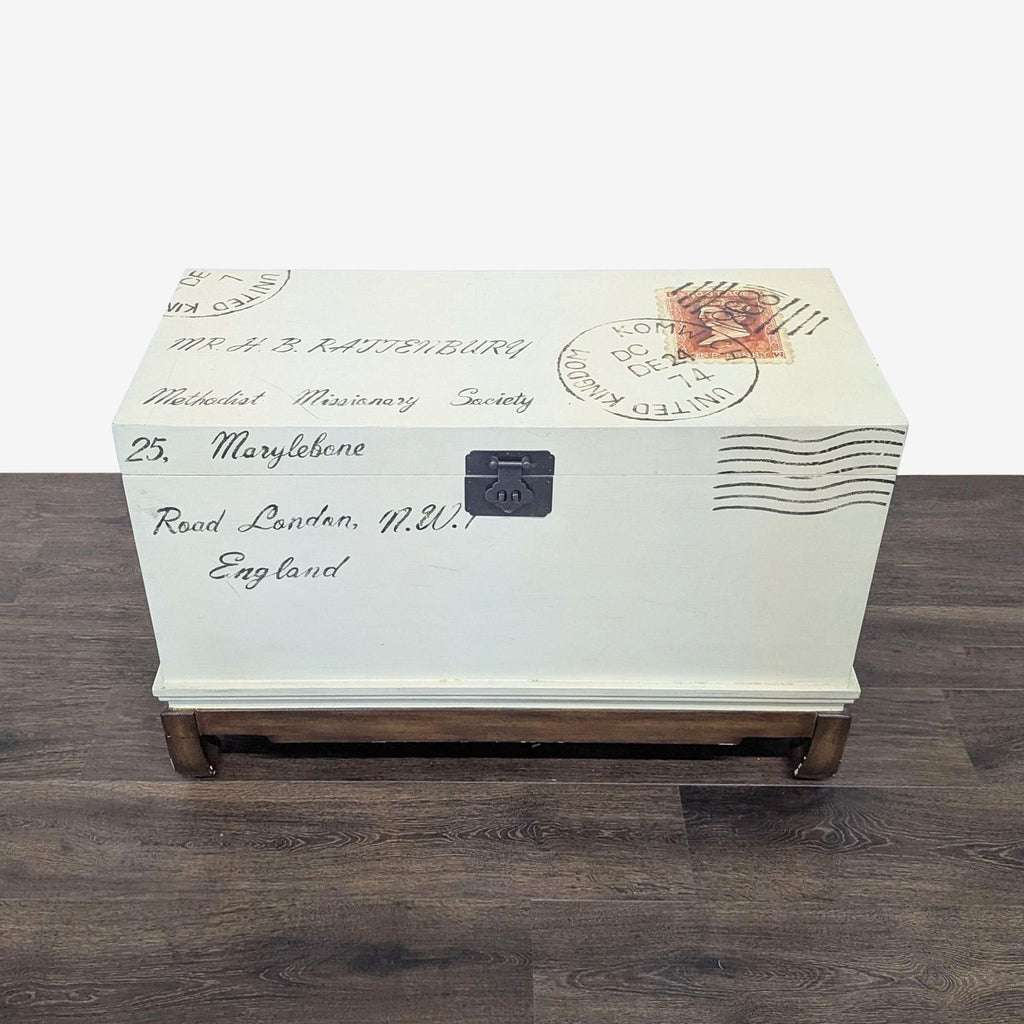 1. Antiqued cream Reperch trunk with hand-painted postage symbols and vintage postal lettering on the exterior.  