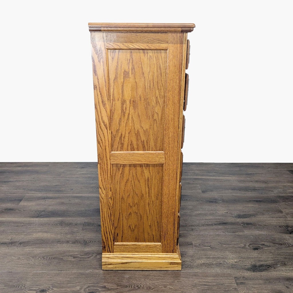 3. Profile view of Reperch's classic oak dresser, highlighting its paneled side and traditional wood finish.
