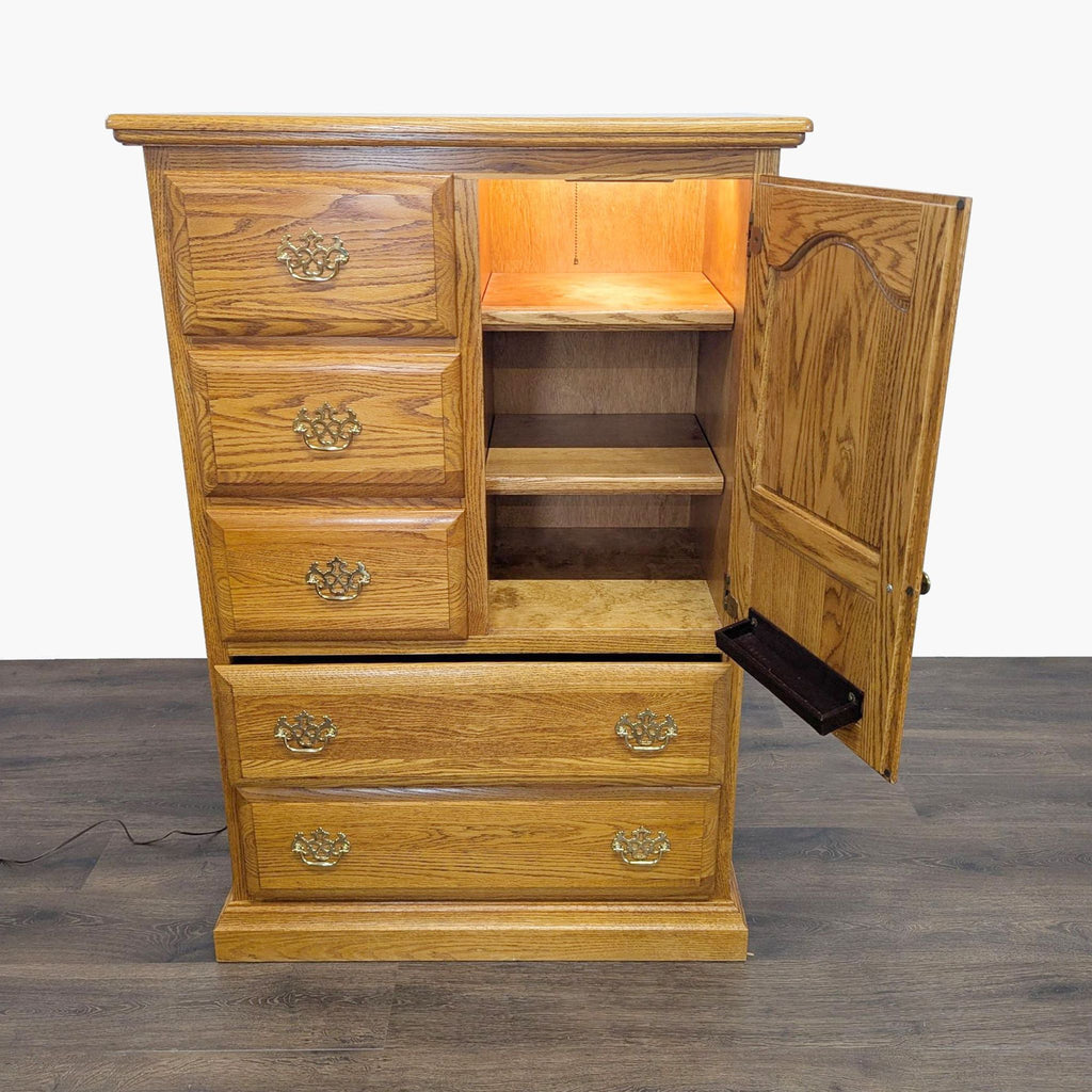 1. Solid oak Reperch dresser with 5 drawers and an open lighted cabinet, shown with the door ajar.