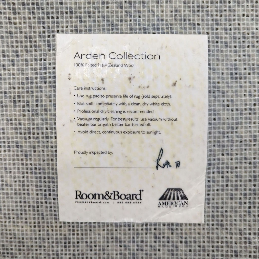 3. Label from Room & Board with care instructions for Arden Collection New Zealand wool rug.